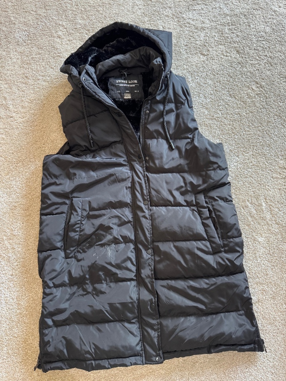 black puffer vest